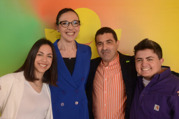 Rachelle Deguara, Sandra Gauci, Ralph Cassar and Mina Jack Tolu stand in front of an ADPD banner.